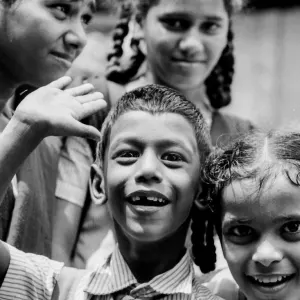 Girls in pigtails and a cheerful boy