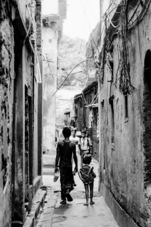 Man and girl walking lane