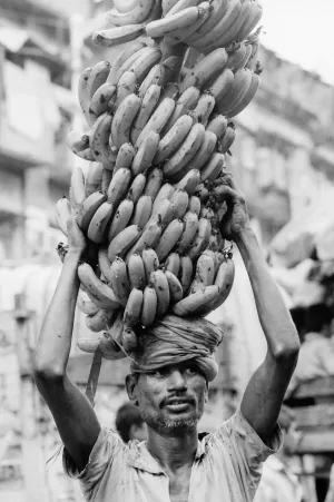 Big bunch of banana on head