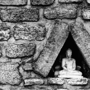 Buddha statue in triangle