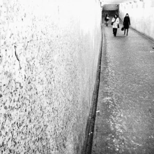 man playing in pedestrian subway