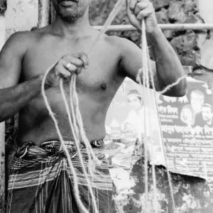 Man holding scale up