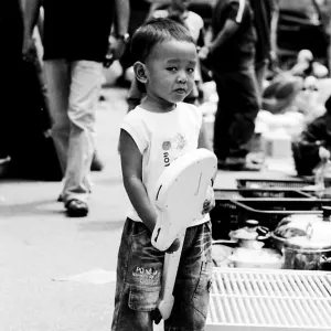 Boy holding guitar