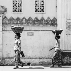 Women putting burden on head