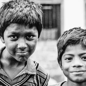 two boys puffing cheeks