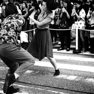 Women dancing in street