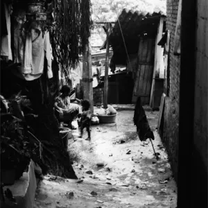 Parent and child relaxing in dim lane