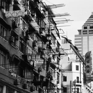 Washing poles projecting from building