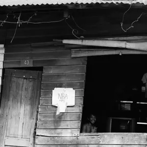 Boy smiling in wooden house