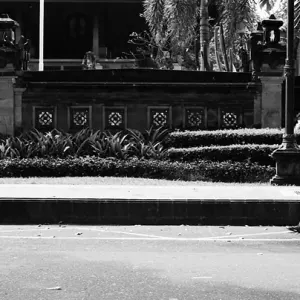 Woman walking with big tray on head