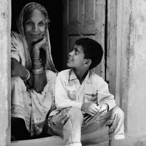 Grandmother relaxing with grandson