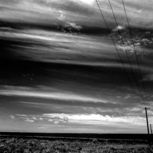 Country road under sky