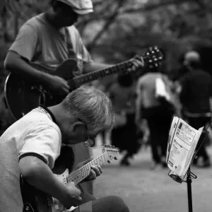 Men playing guitar