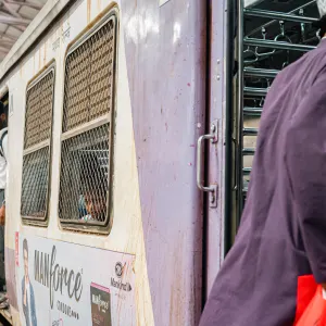 Man boarding a train