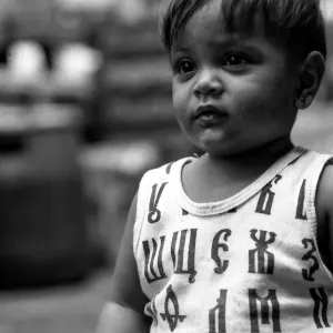 Boy wearing shirt with Cyrillic letters