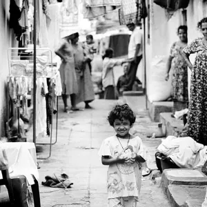 Little girl smiling in lane