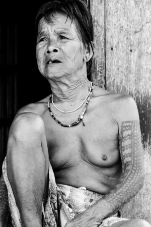 Older woman with tattoo