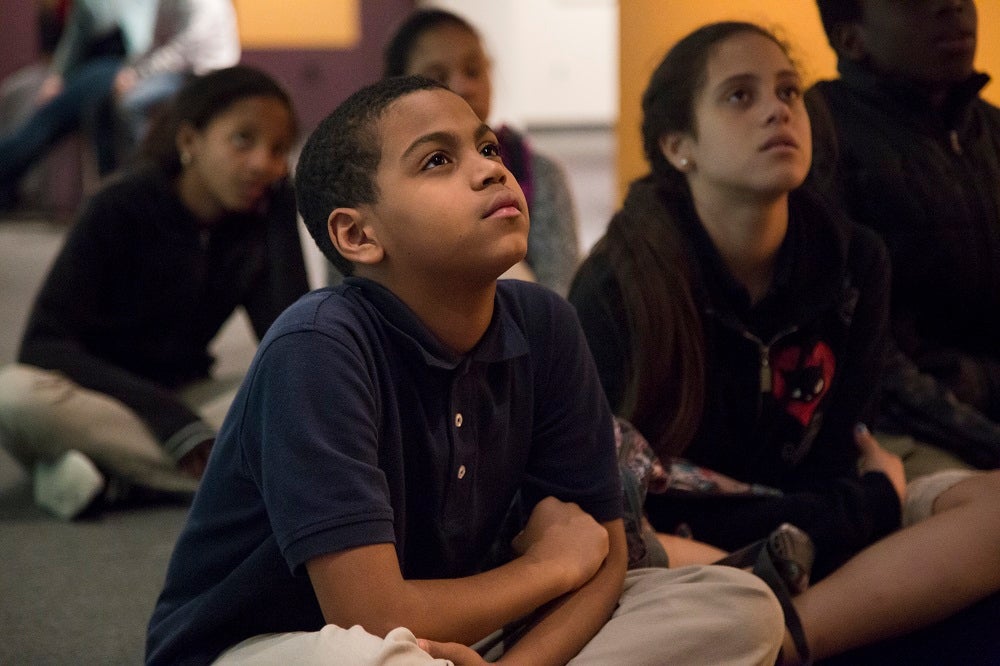 Kids participating in an educational program