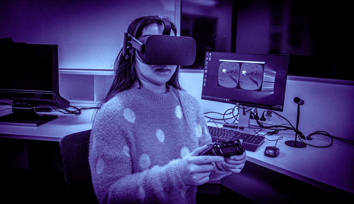 Woman wearing virtual reality goggles