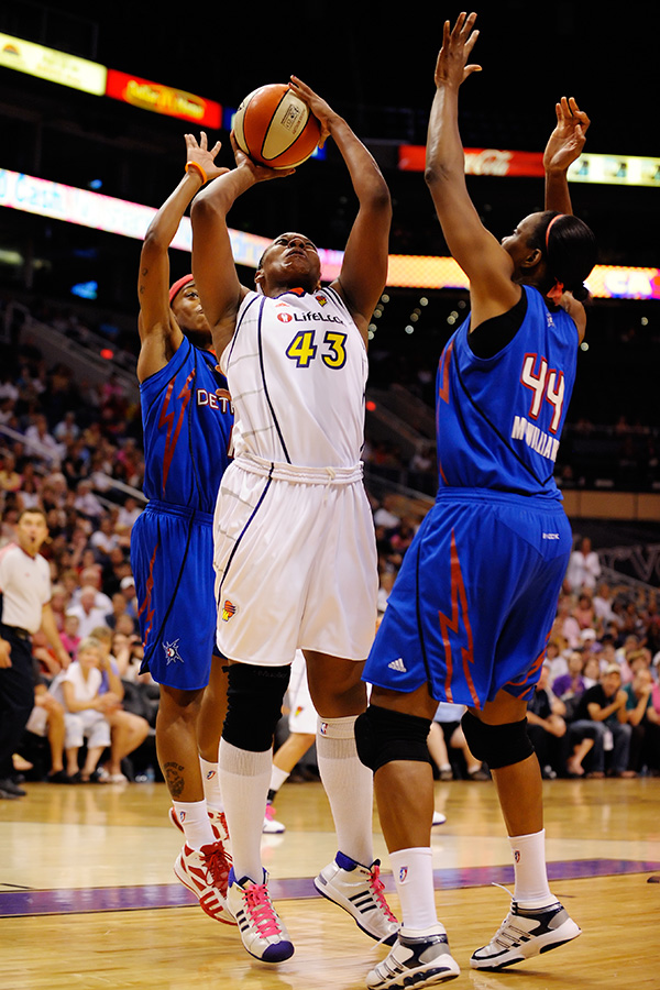 Le'coe Willingham fights for a basket against the Detroit Shock on July 18th, 2009.