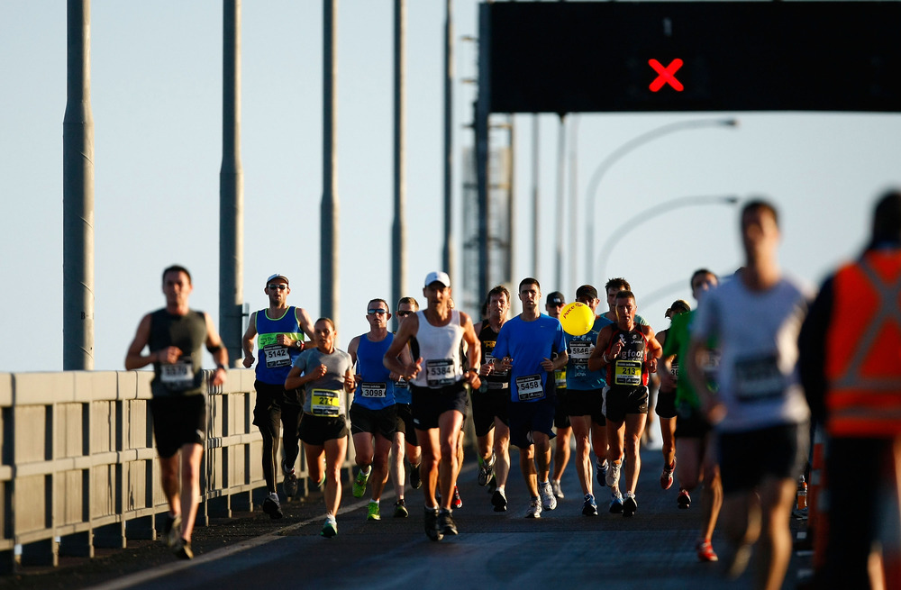 AUCKLAND, NEW ZEALAND - OCTOBER 30:  Competitors cross the Auckland Harbour Bridge during the 2011 Auckland Marathon on October 30, 2011 in Auckland, New Zealand.  (Photo by Simon Watts/Getty Images)