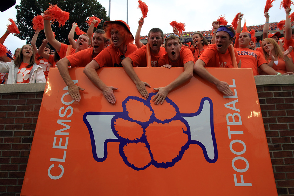 CLEMSON, SC - SEPTEMBER 17:  Fans of the Clemson Tigers cheer on their team against the Auburn Tigers at Memorial Stadium on September 17, 2011 in Clemson, South Carolina.  (Photo by Streeter Lecka/Getty Images)