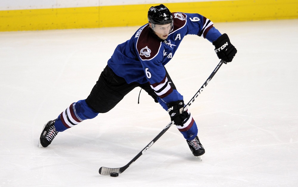 April 5, 2012; Denver, CO, USA; Colorado Avalanche defenseman Erik Johnson (6) controls the puck against the Columbus Blue Jackets during the second period of the game at the Pepsi Center. Mandatory Credit: Ron Chenoy-US PRESSWIRE