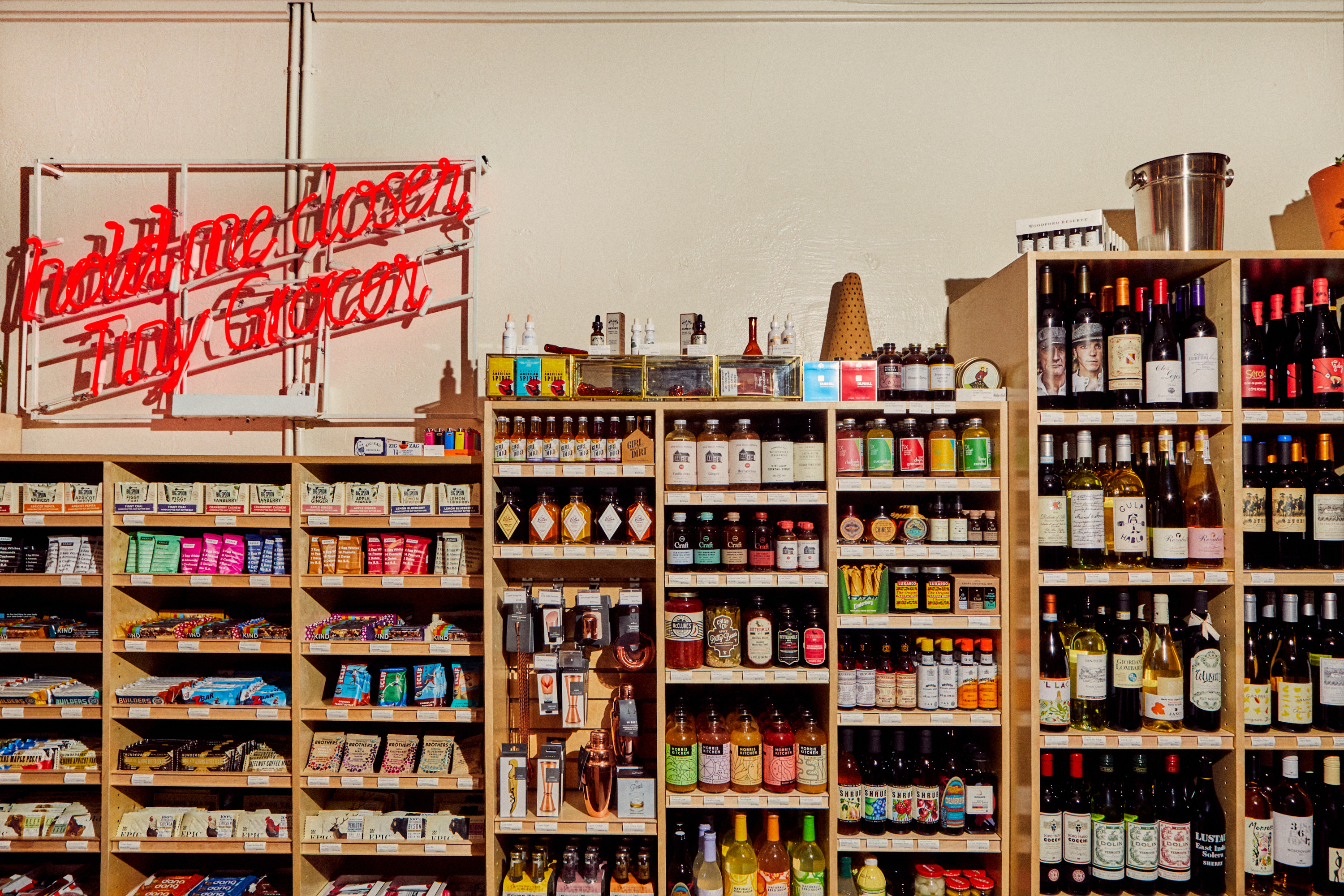 A grocery store shelves with goods.