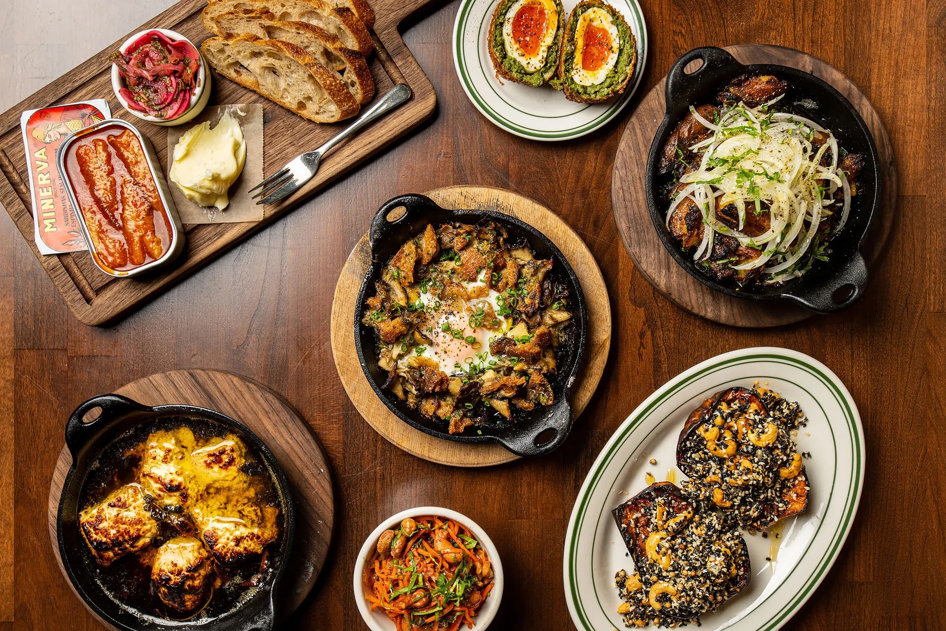 Spanish dishes like conservas, a chorizo-stuffed scotch egg, roasted squash, and more at Bar Moruno.