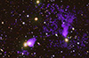 Tour: NASA's Chandra Finds Galaxy Cluster That Crosses the Streams