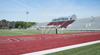 Play at McMaster - McMaster Ron Joyce Stadium - McMaster football field surrounded by stadium bleachers