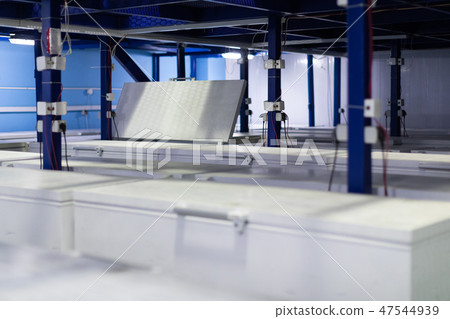 Warehouse with white refrigerators 47544939