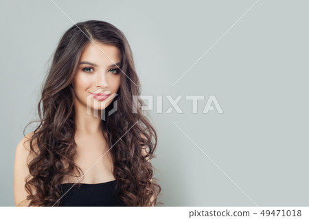 Smiling mode brunette woman with natural makeup 49471018