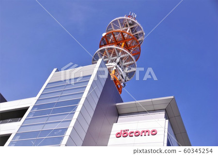 Mobile phone company building and radio tower Business image 60345254