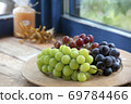 Grape placed on the windowsill 69784466