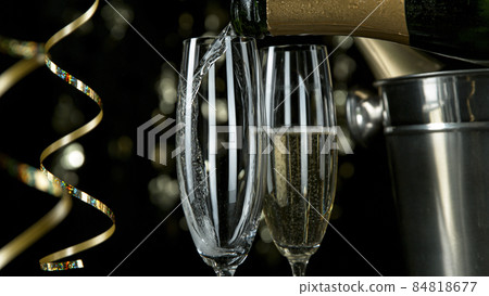 Freeze motion of pouring champagne into flute. 84818677