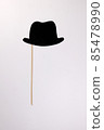 Black hat shape paper die cut selfie portrait party fun paper prop sticker stick on white background  85478990