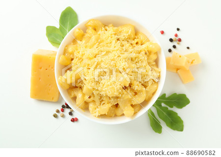 Plate with macaroni and cheese on white background 88690582