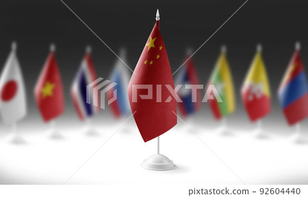 The national flag of the China on the background of flags of other countries 92604440