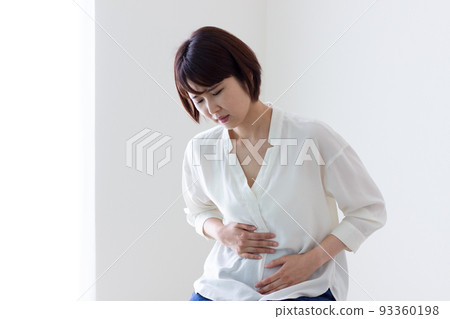 Woman with stomachache 93360198