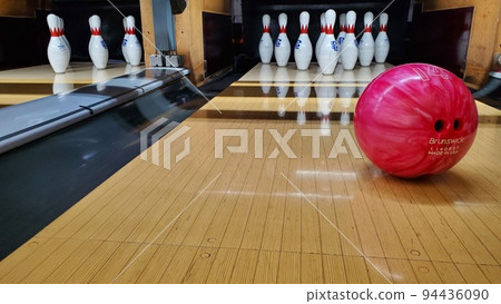 [Bowling alley] Ball for adults rolling down the lane (pink horizontal shot) 94436090