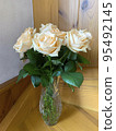 Bouquet of fresh roses in crystal vase. Studio Photo 95492145