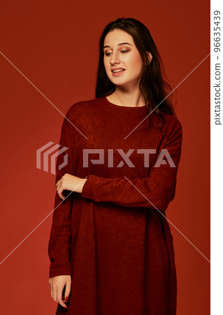 beautiful young brunette woman in nice summer boho dress, posing in a studio. Fashion spring summer photo 96635439