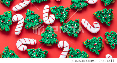 Christmas colored handmade gingerbread cookies, flat lay. 98824811