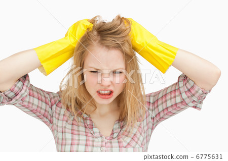 Woman pulling her hair 6775631