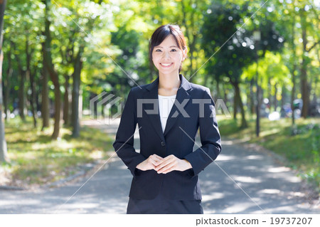 A woman relaxing in the park 19737207