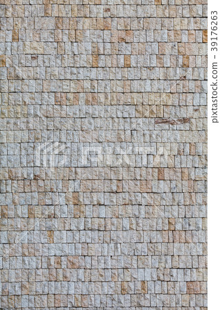 Wall with small grey granite tiles 39176263