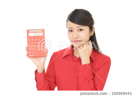 A woman thinking with a calculator 100909443