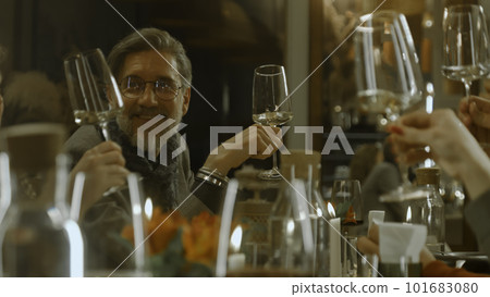 Close up shot of waiter pouring red wine 101683080