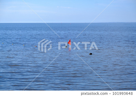 Fishing nets have marker flags for easier spotting. Baltic Sea 101993648